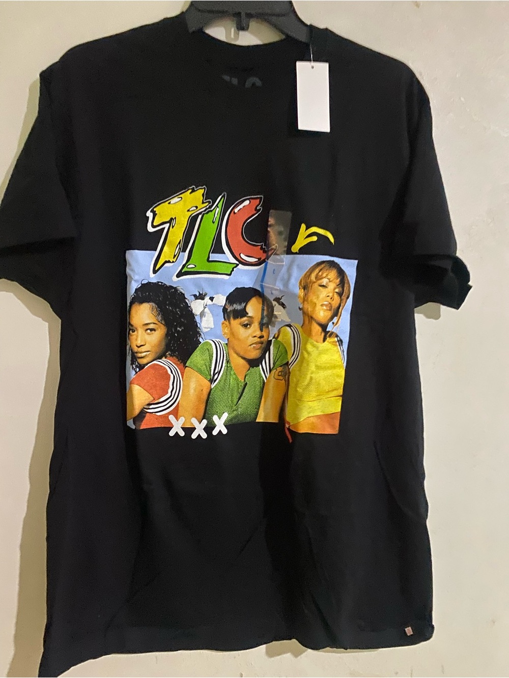 TLC Black Tee with White Logo and Multicolor Stripes